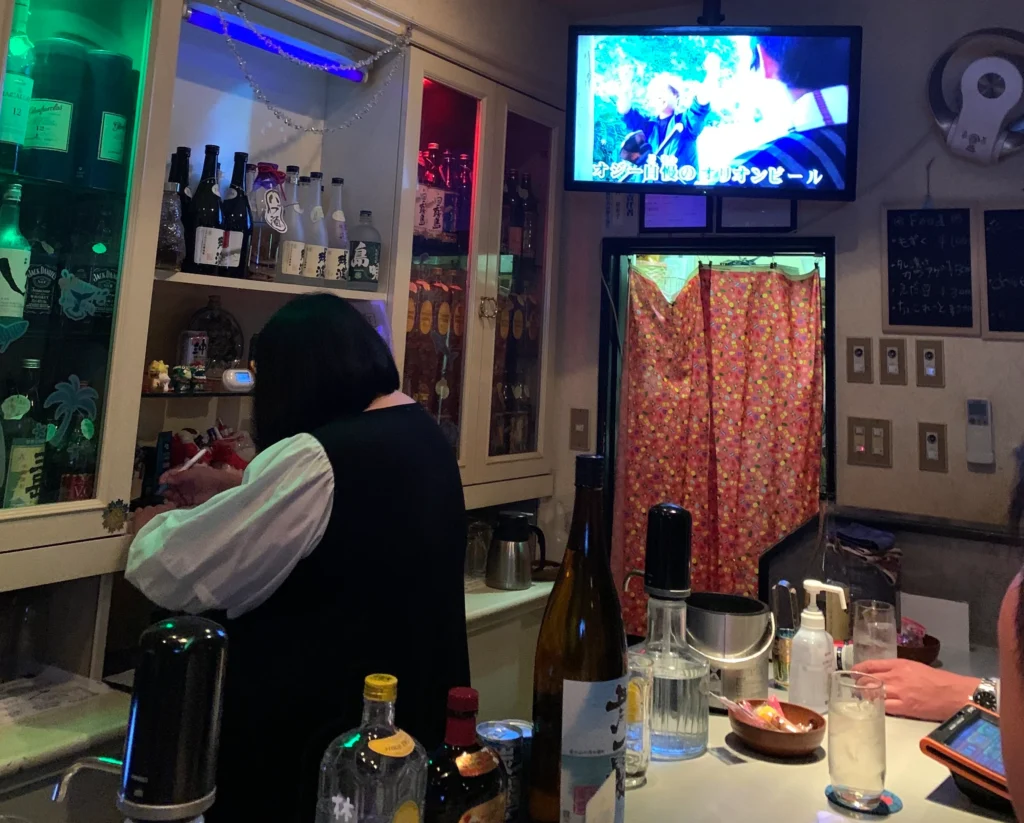  A snack bar, or sunakku, is a much more wholesome and community-oriented establishment.