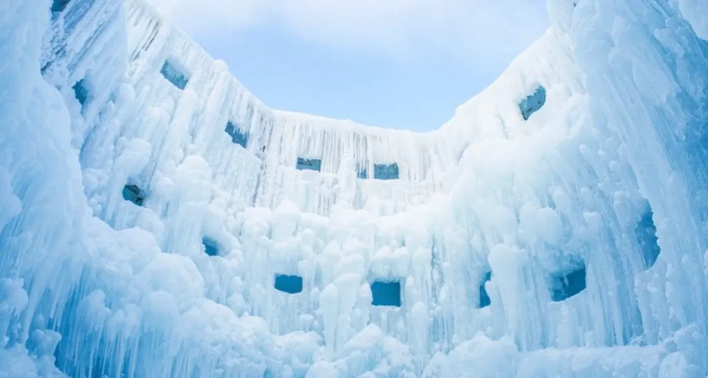 Daytime view of the ice sculptures, showing the natural 'Shikotsu Blue' color.