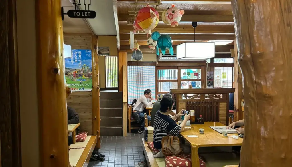 The traditional and cozy interior of Imakin Shokudo, a restaurant with over 100 years of history.