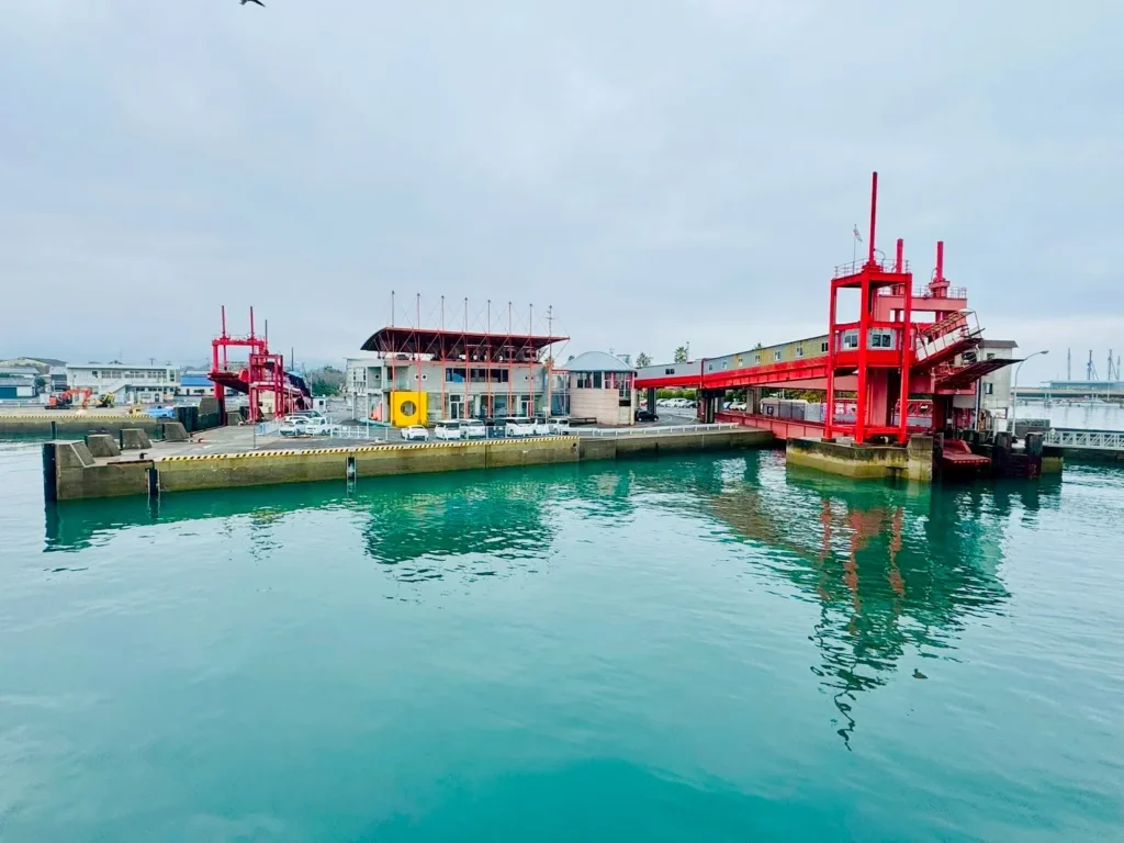 Ariake Ferry terminal with red car-loading ramps at the port on the Kumamoto–Nagasaki route