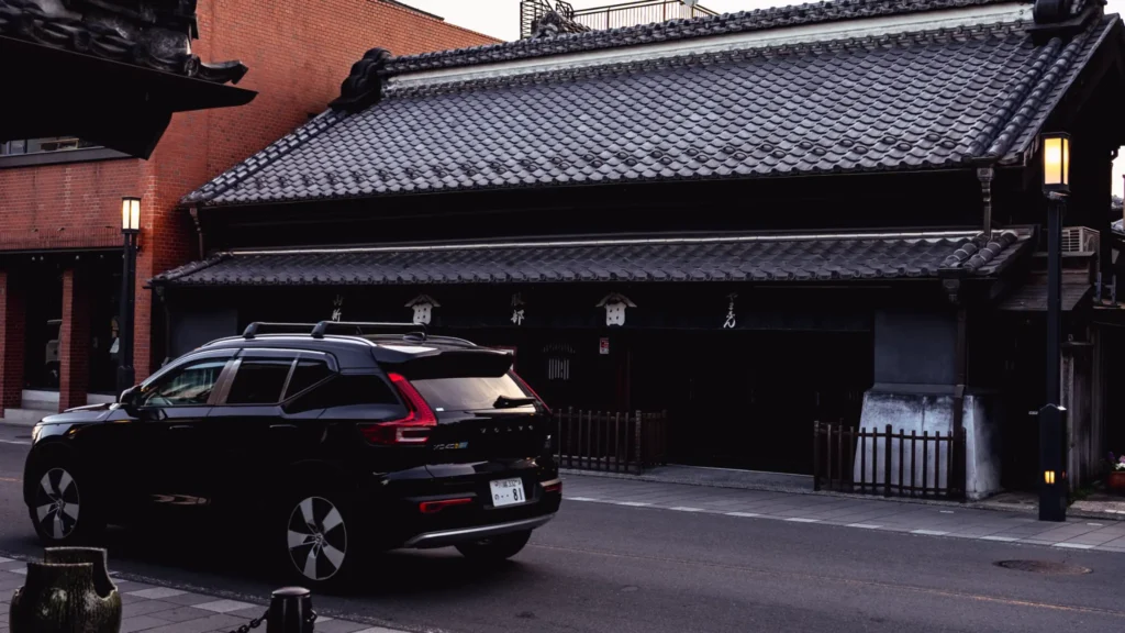 A detailed view of a Kurazukuri gate structure in Kawagoe, showcasing the traditional architecture of the merchant houses.