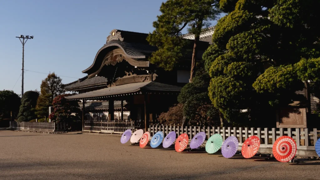 A long, polished wooden corridor typical of traditional Japanese palace architecture.
