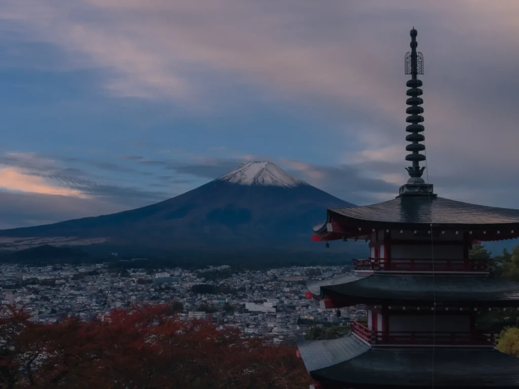 Mount Fuji viewed from Chureito Pagoda observation deck at Arakurayama Sengen Park with the Fujiyoshida cityscape below