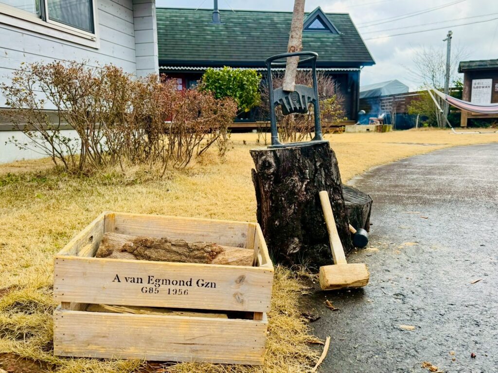 A marshmallow roasting and coffee experience set on the dining table at BESS Kumamoto, with large marshmallows in a glass jar and a hand coffee grinder.