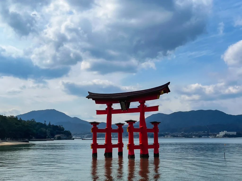 The iconic floating torii gate of Itsukushima Shrine standing in the sea