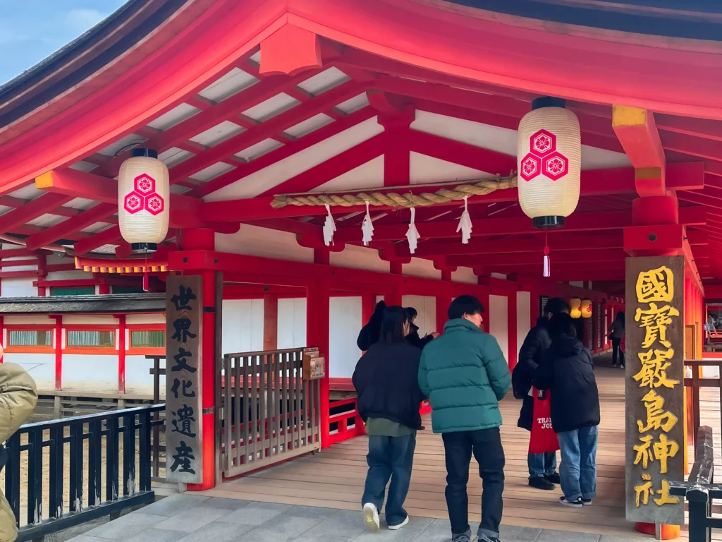 The main entrance of Itsukushima Shrine with plum-blossom crest lanterns