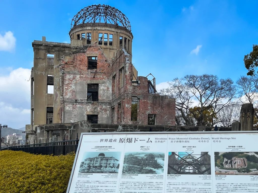 The Atomic Bomb Dome with the UNESCO World Heritage information sign in the foreground