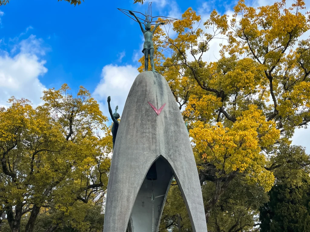 The Children's Peace Monument with the figure of Sadako Sasaki and colorful origami crane displays below
