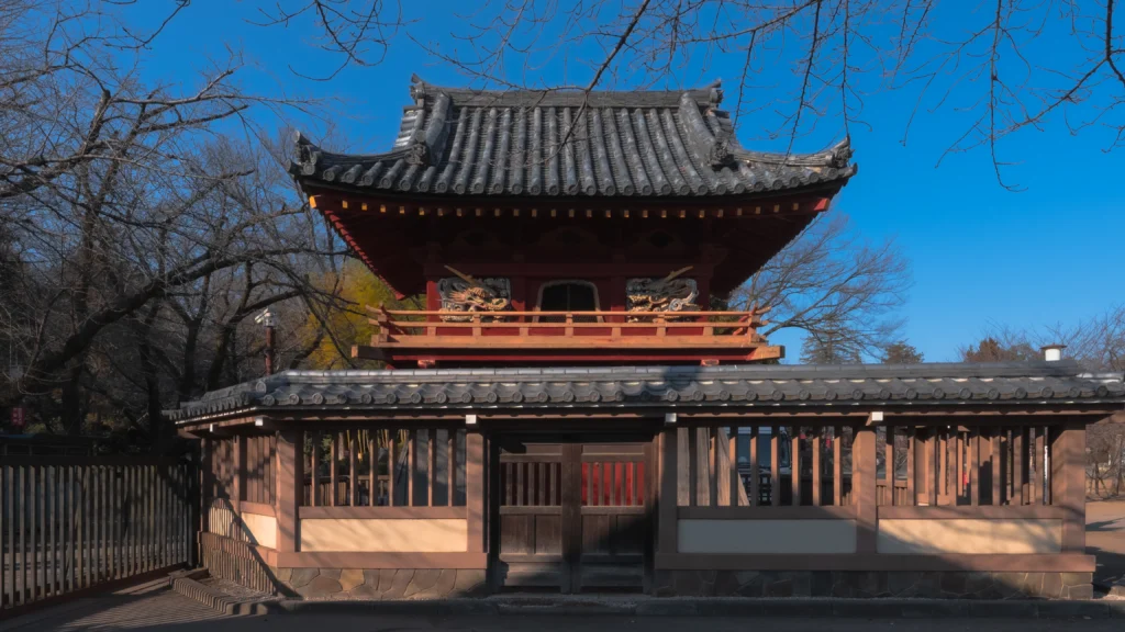 The Shoromon bell tower gate at Kitain with its distinctive hakama-style flared walls, a National Important Cultural Property from 1702