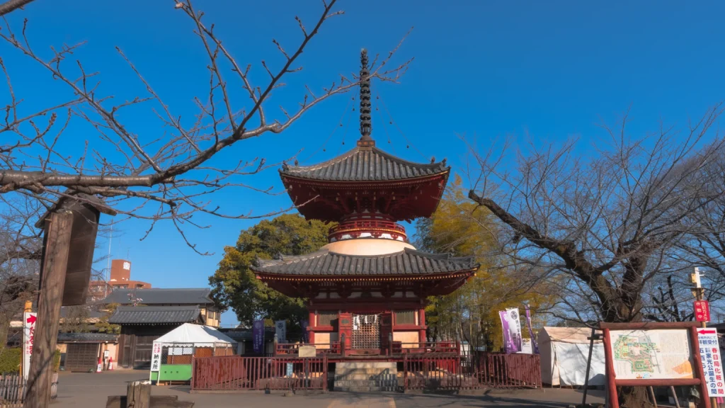 Kitain's Tahoto pagoda built in 1639, a two-storied structure with red railing against blue sky