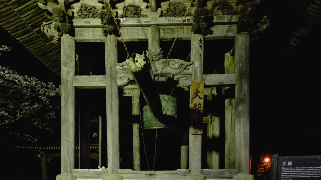 The 400-year-old great bell at Kuonji Temple, housed in its wooden bell tower at night