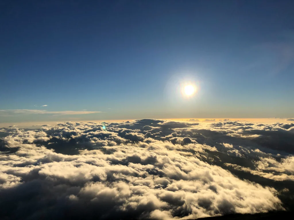 Sun above endless cloud sea from Mt. Fuji summit