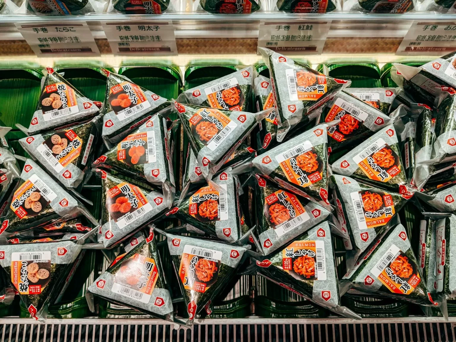 Onigiri rice balls on a Japanese convenience store shelf