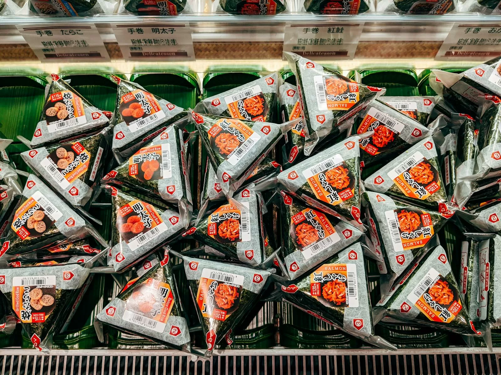 Packaged onigiri rice balls on a Japanese convenience store shelf