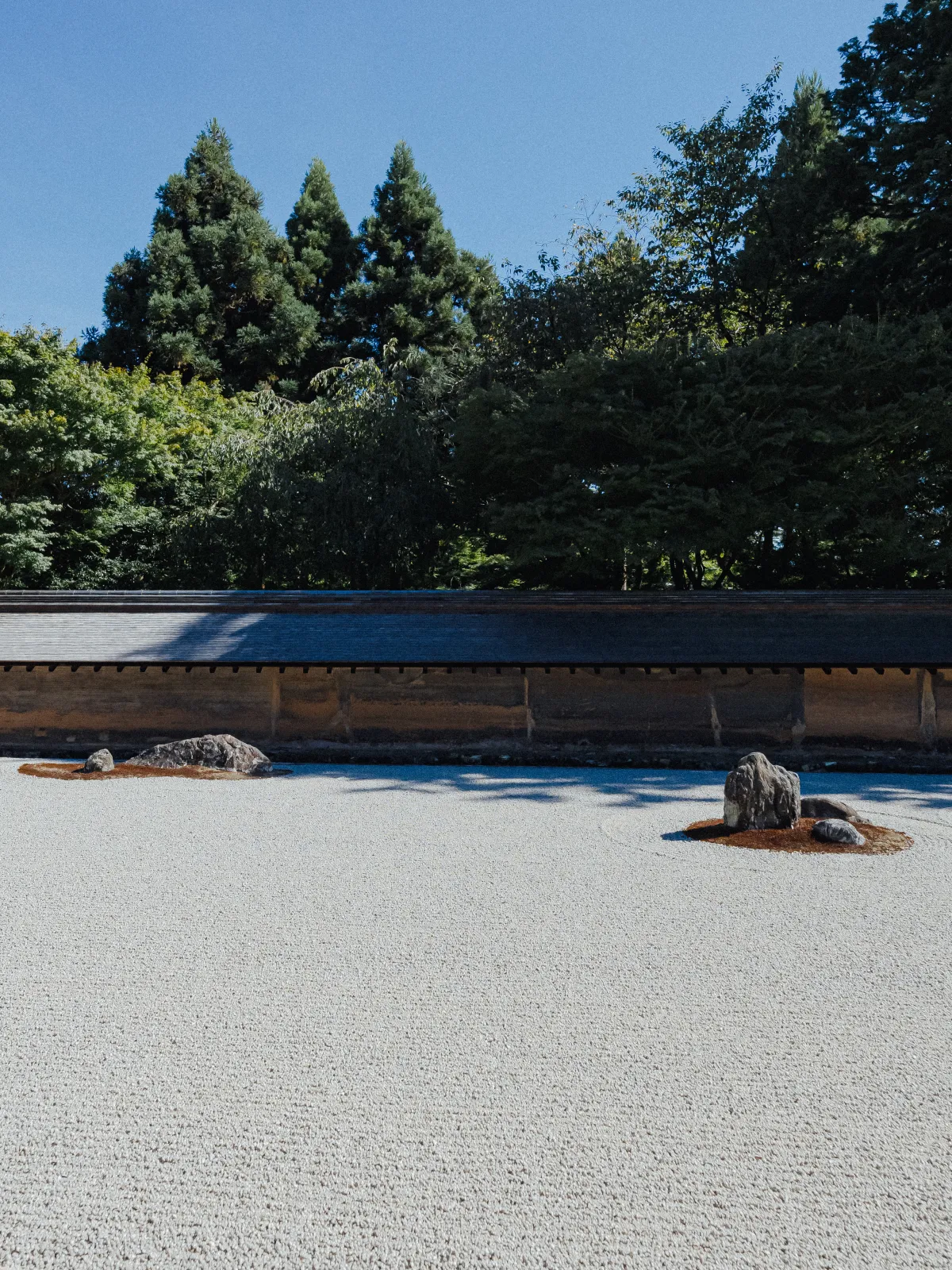Vertical framing of a portion of the Ryoanji rock garden