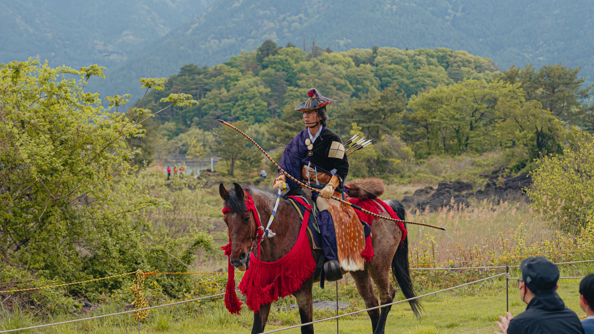 Calm portrait of a yabusame archer on a dappled horse