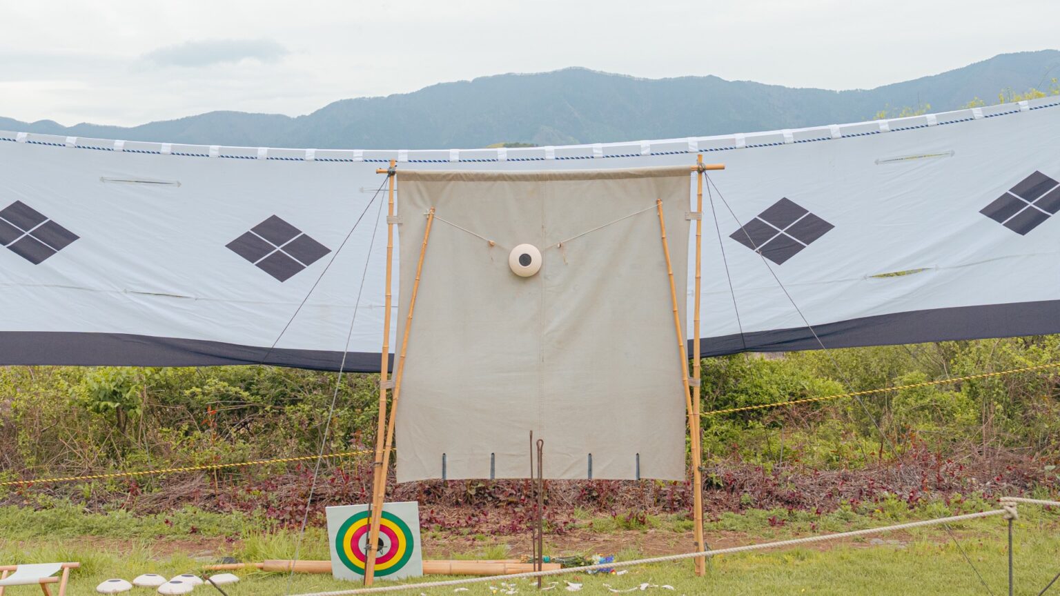 Kawarake mato small clay target on bamboo tripod