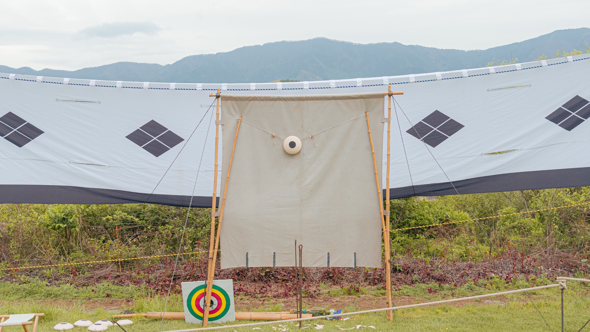 Kawarake mato small clay target on bamboo tripod