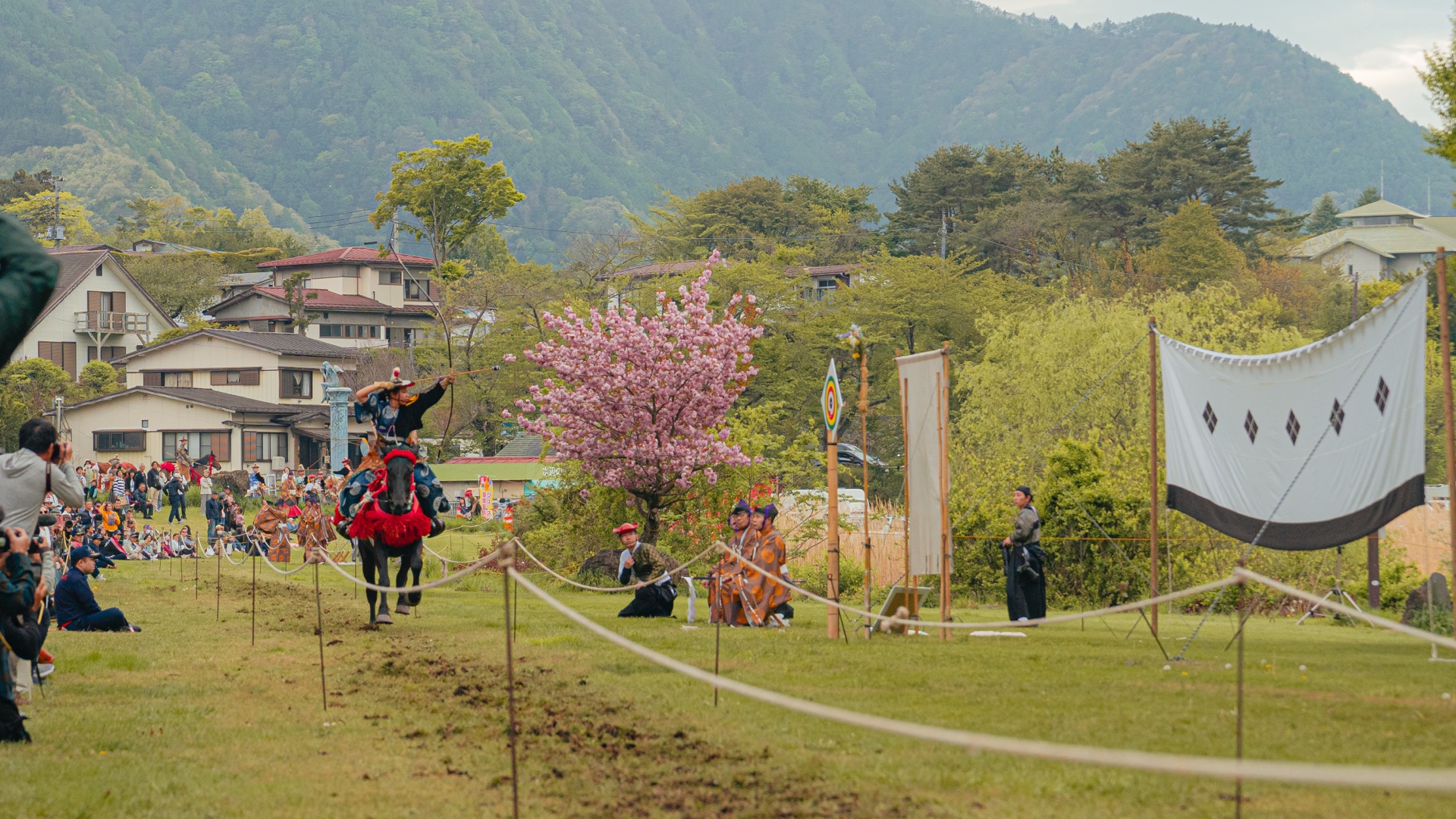 Yabusame archer with bow raised high