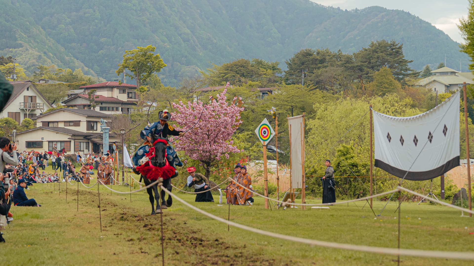 Yabusame archer past the target line, recovering