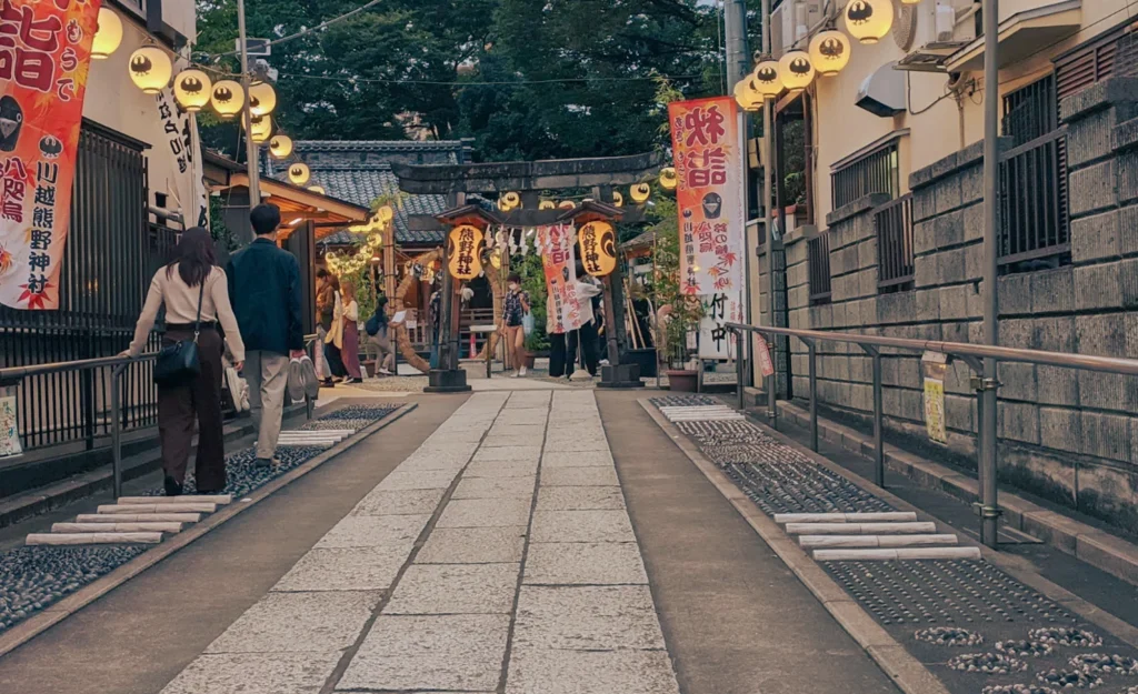This is the Ashifumi Kenko Road (足踏み健康ロード), a foot reflexology path installed in 2004 that runs approximately 10 meters along both sides of the main walkway.
