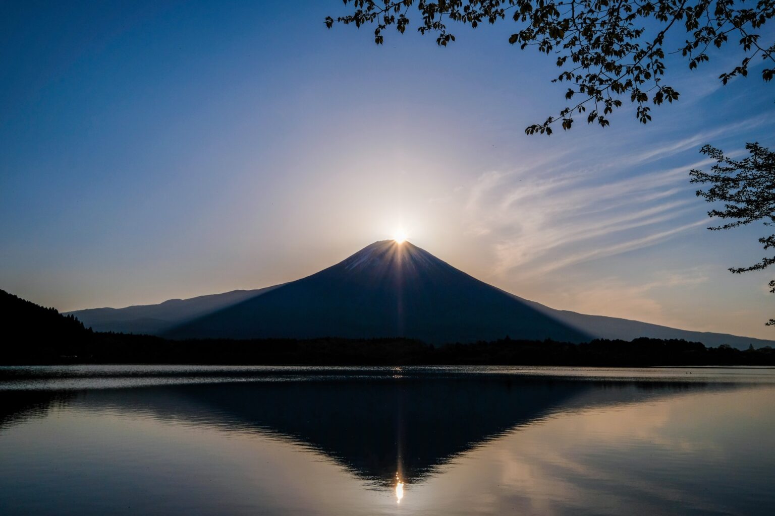 Sunrise Diamond Fuji at Tanuki Lake in Fujinomiya Shizuoka with mirror reflection