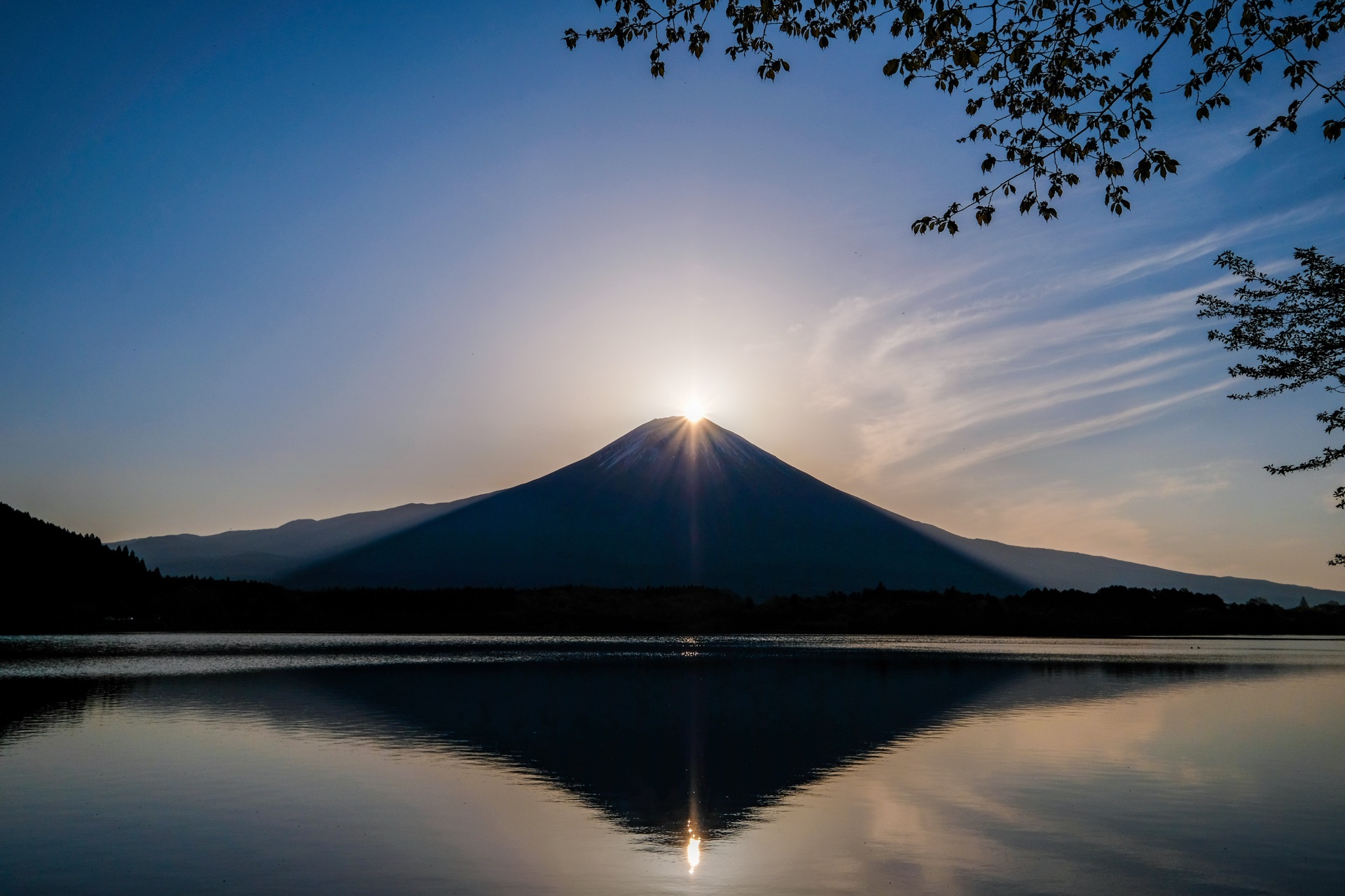 Sunrise Diamond Fuji at Tanuki Lake in Fujinomiya Shizuoka with mirror reflection
