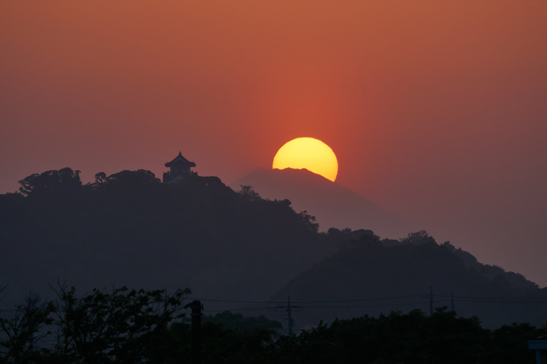 Sunset Diamond Fuji with Tateyama Castle silhouette in foreground from Chiba