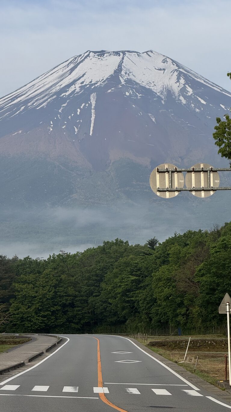 Mt Fuji clearly visible from Fujiyoshida road on May 26 2026, snow-capped summit and detailed slopes
