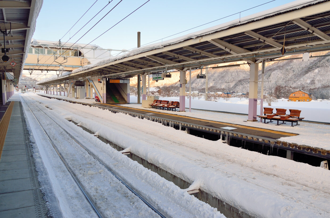 Hakuba Station platform buried in deep snow in winter