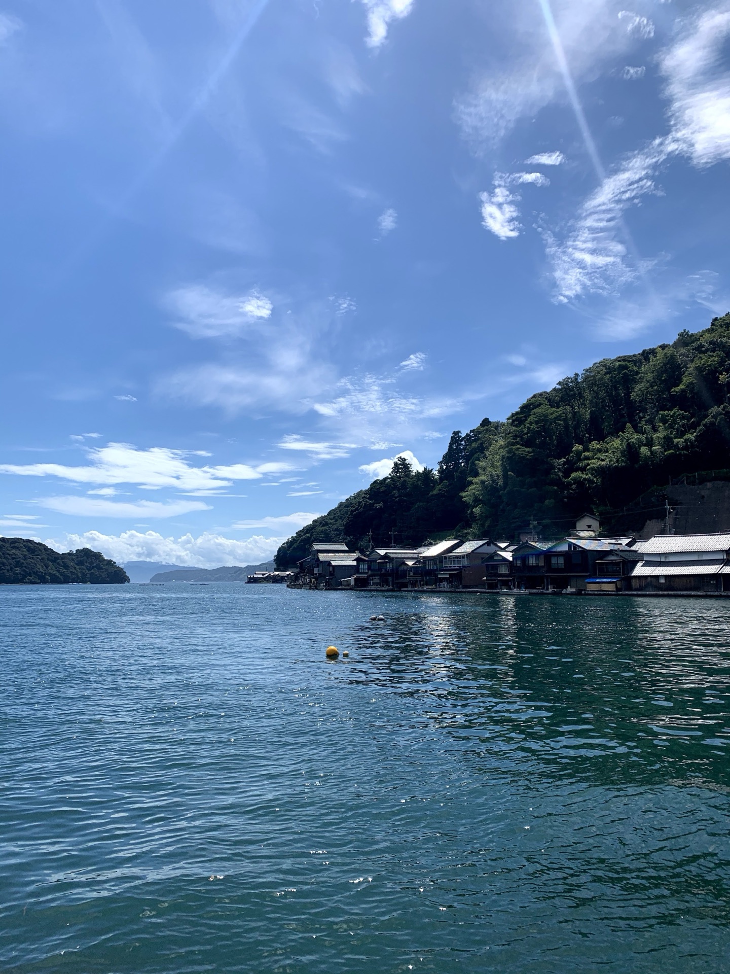 Wide panorama of Ine Bay opening toward the sea