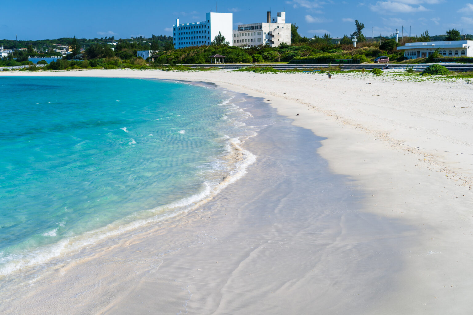Yoron Island white-sand beach with crystal-clear water on a sunny day