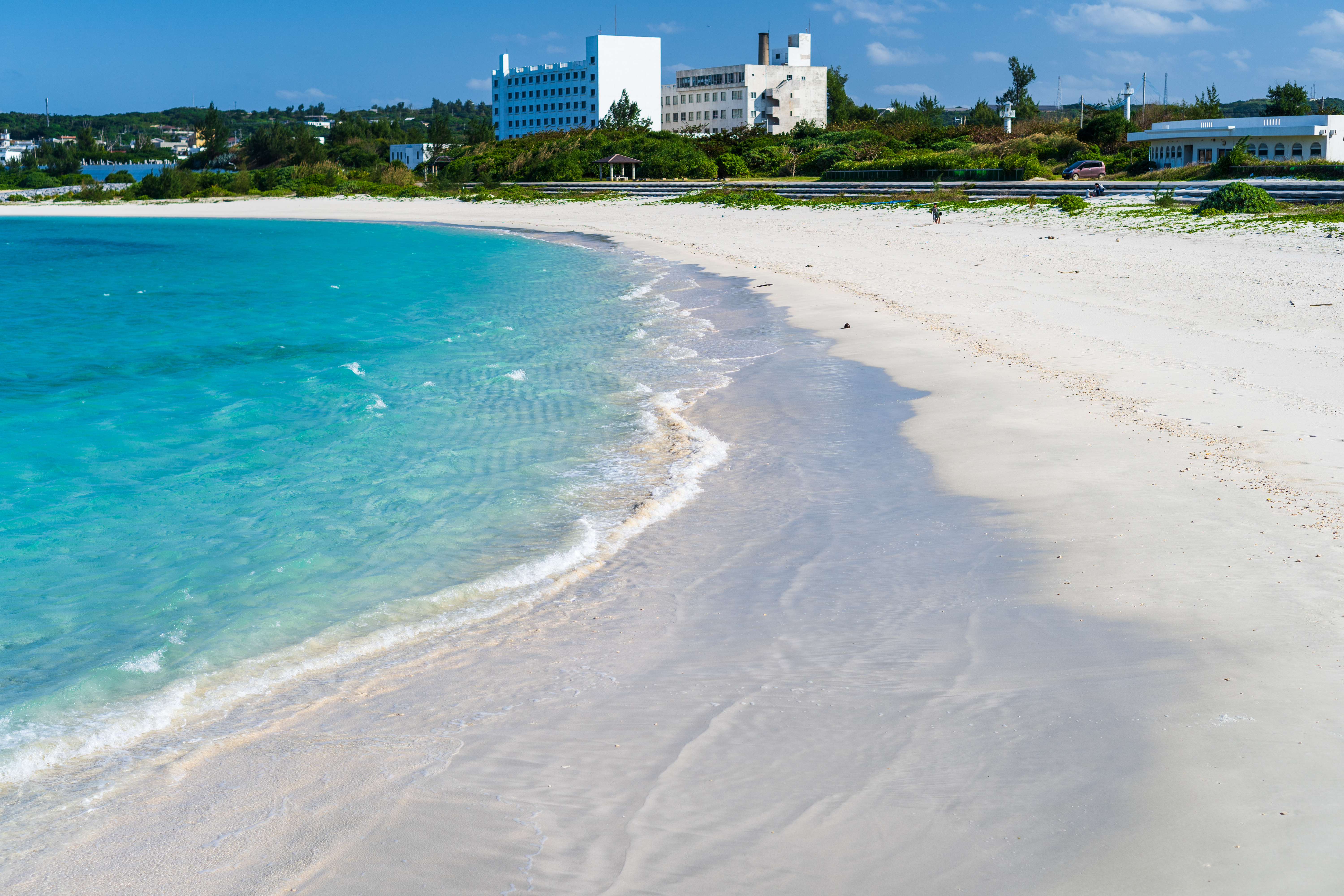 Yoron Island white-sand beach with crystal-clear water on a sunny day