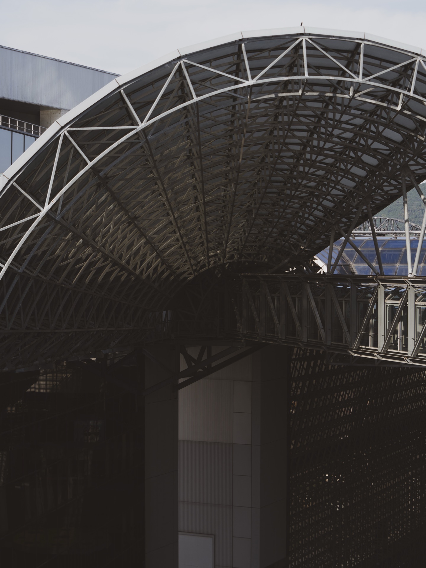 The barrel-vault arched roof of Kyoto Station seen from outside