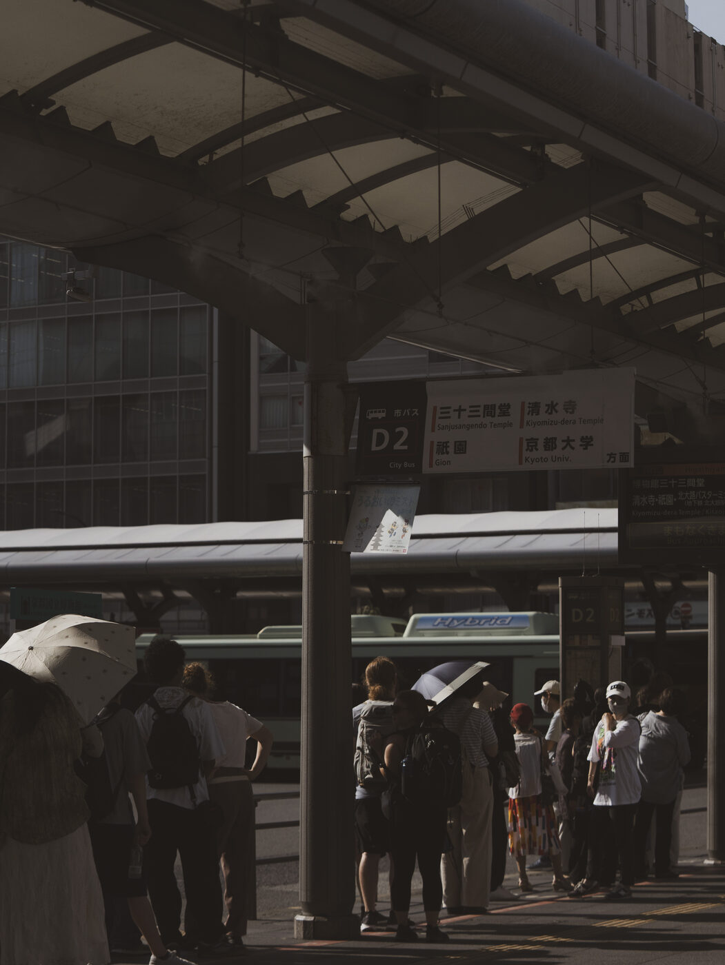 Kyoto Station bus terminal D2 stop with signage for Sanjusangendo and Toji