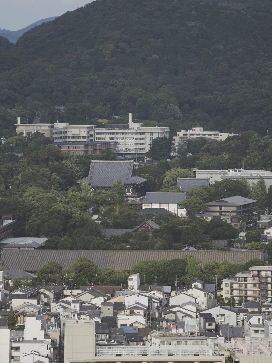 The base of Kyoto Tower as seen from the rooftop terrace of Kyoto Station