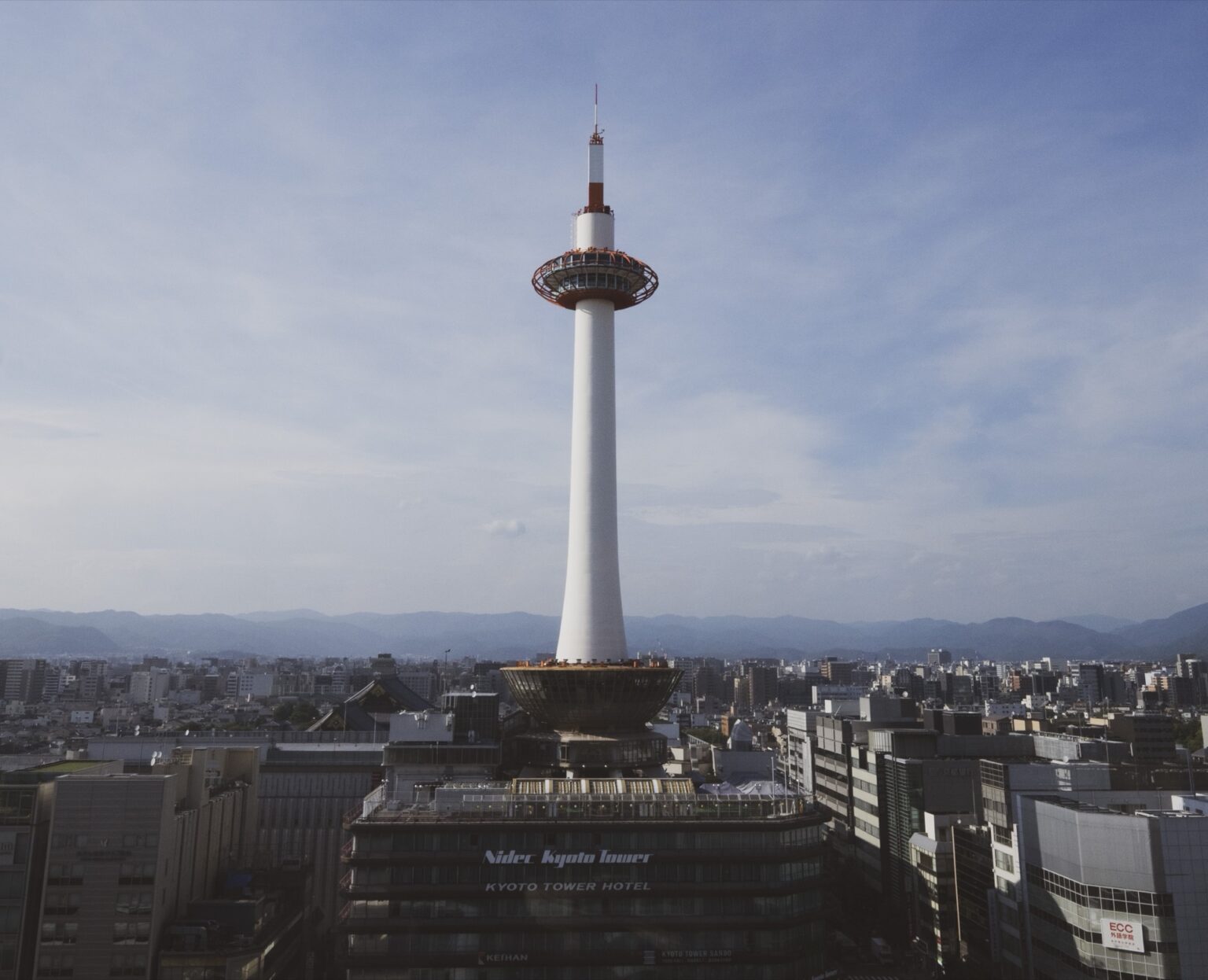 Kyoto tower exterior with hotel signage