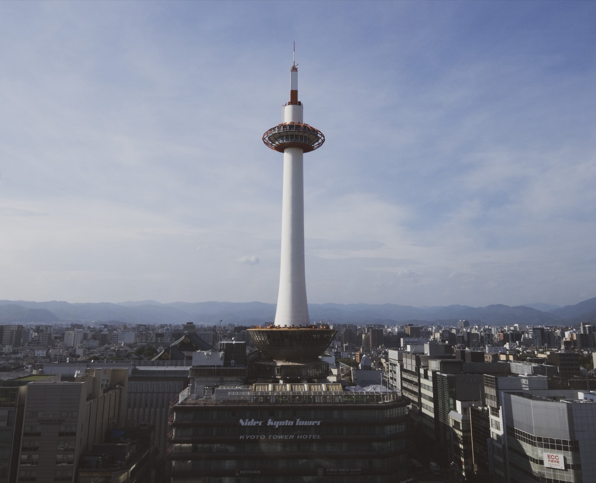 Kyoto tower exterior with hotel signage
