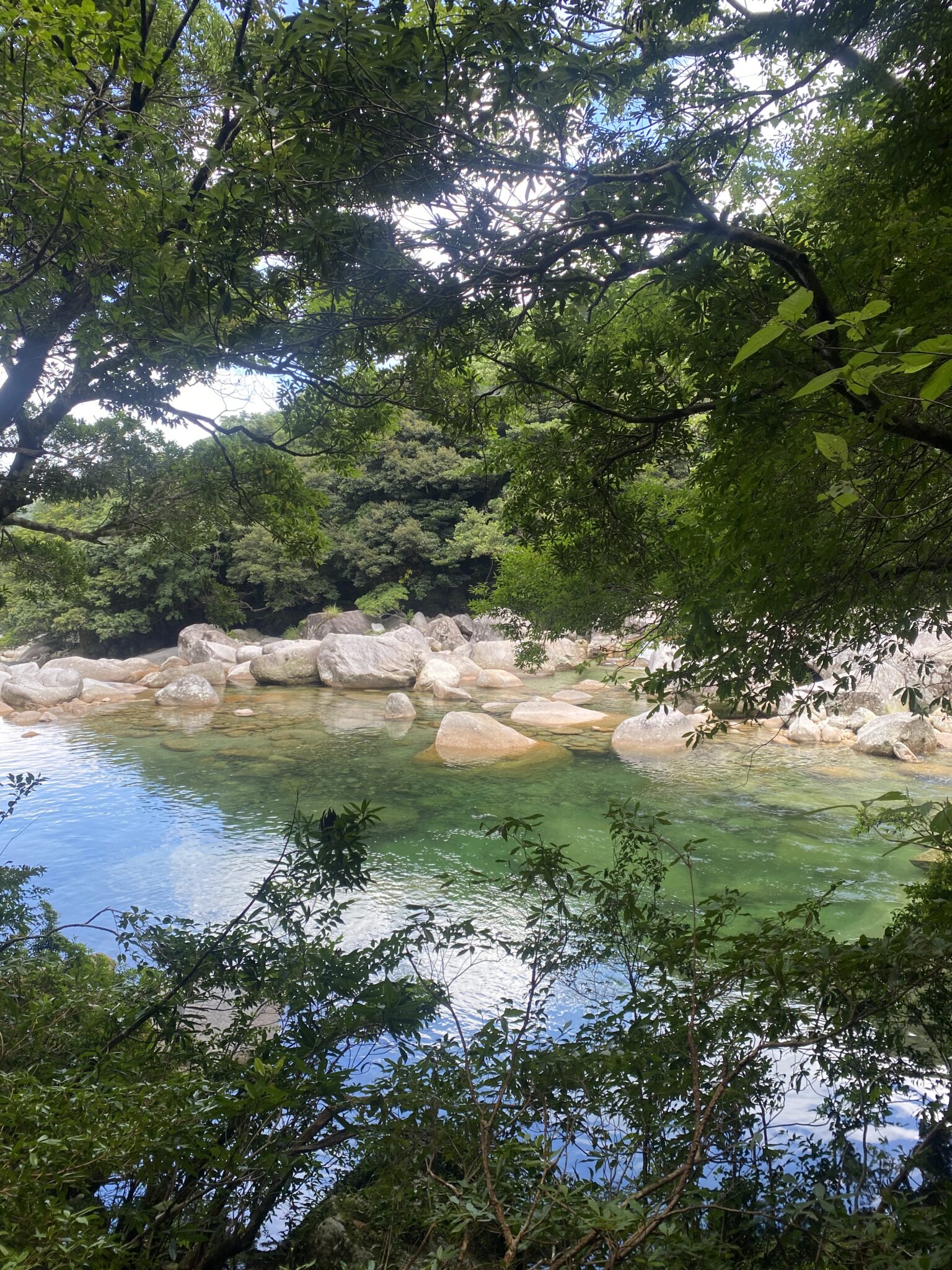Yokogawa Valley smooth granite rocks and emerald stream pools in summer