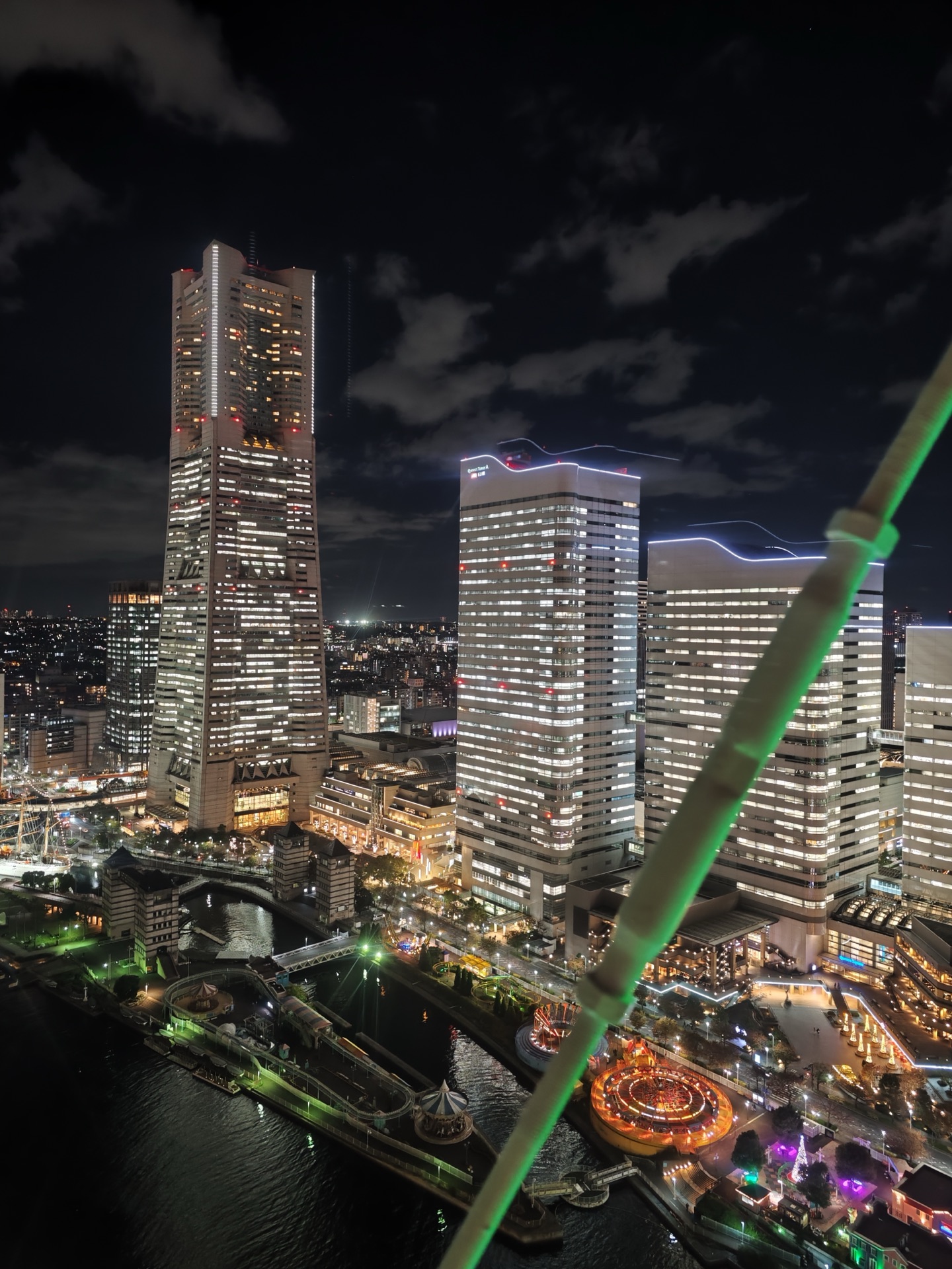 View of Yokohama Landmark Tower at night from Cosmo Clock 21 cabin