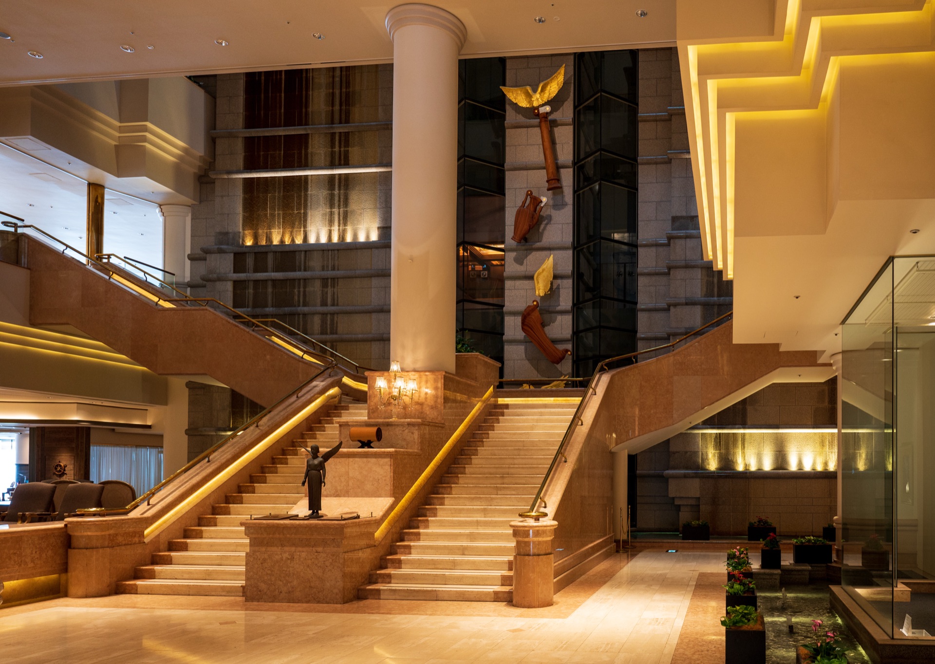 Yokohama InterContinental lobby with grand marble staircase and bronze statue