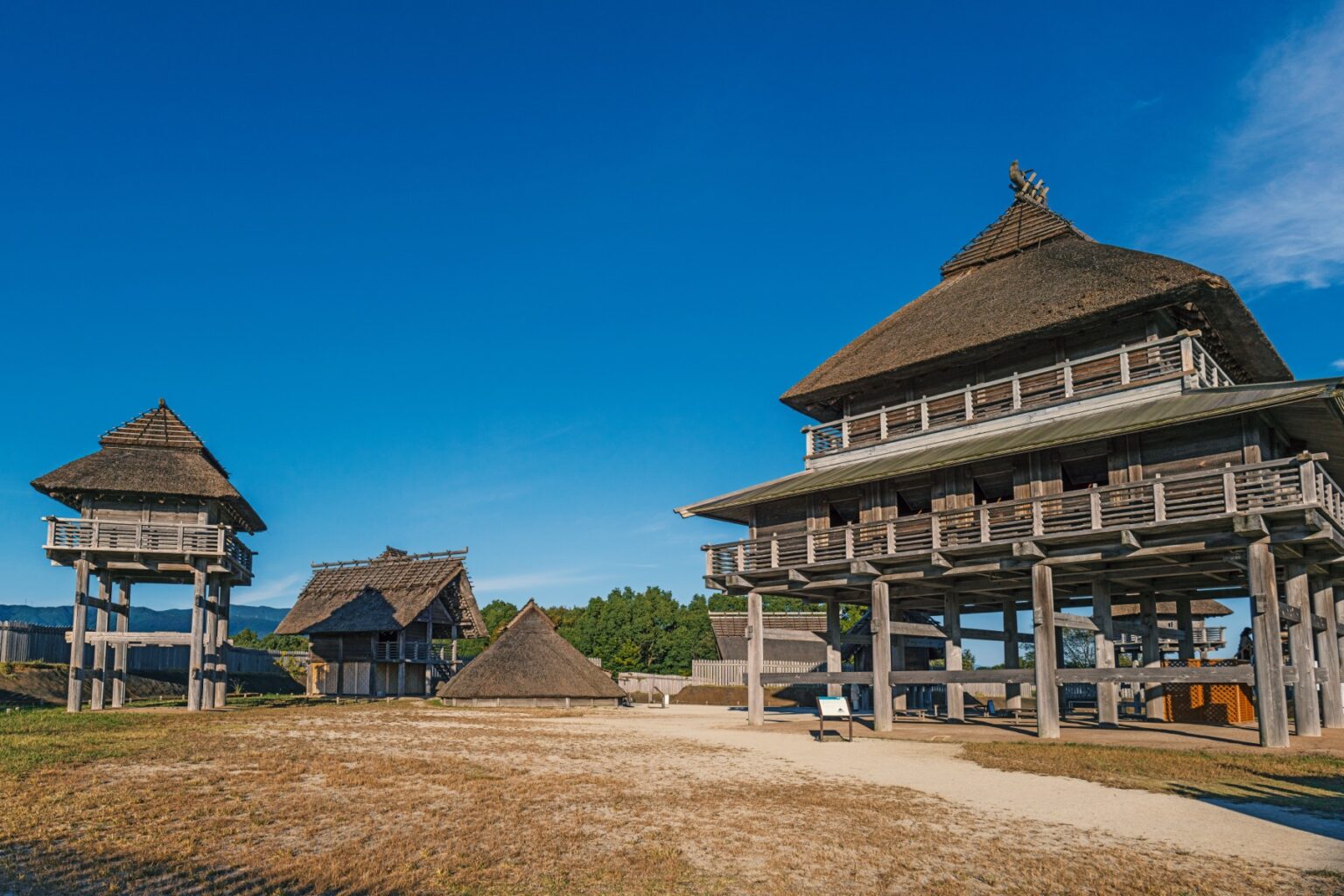 The reconstructed south inner enclosure at Yoshinogari Historical Park in Saga, with tall wooden watchtowers