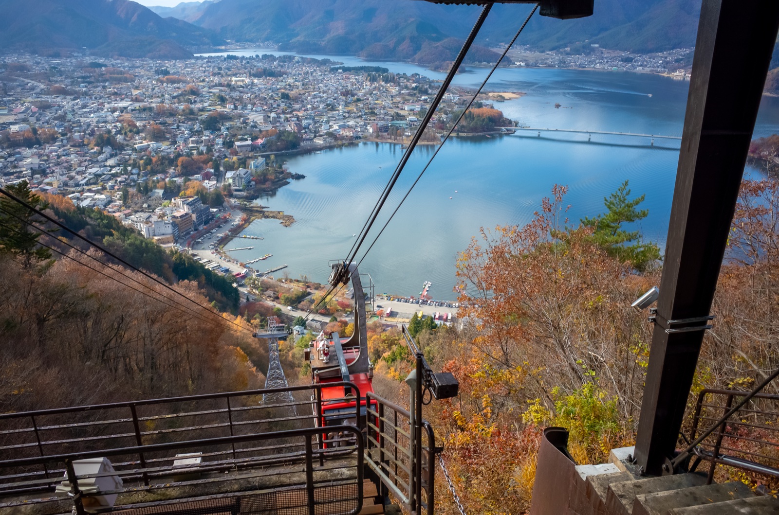 The Mt Fuji Panorama Ropeway station and gondola above Lake Kawaguchi in autumn