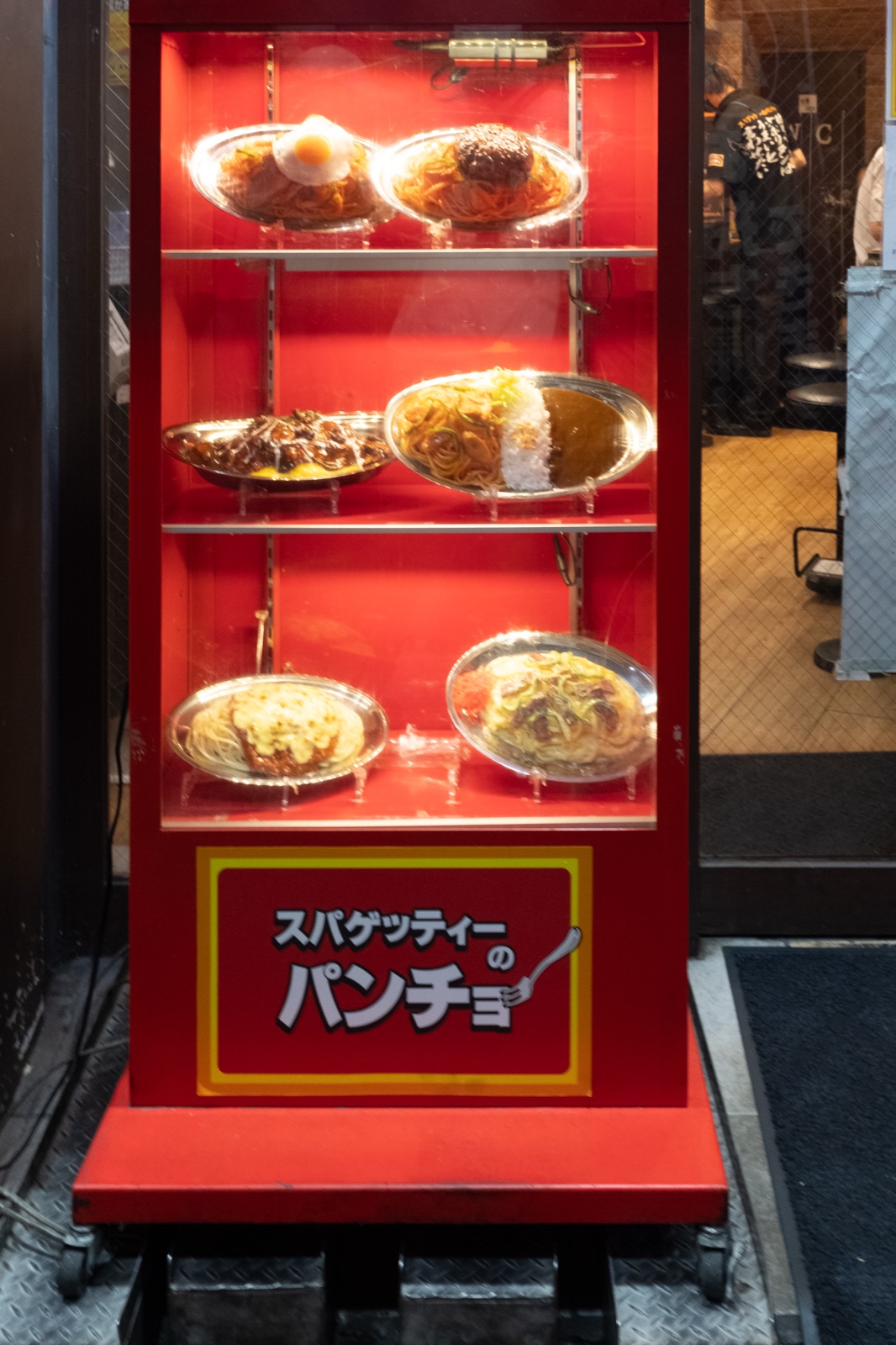 Red display case with napolitan sample plates at Pancho Kichijoji