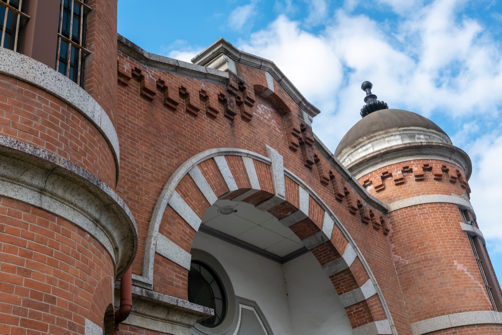 The arched red-brick front gate of the former Nara Prison in Nara