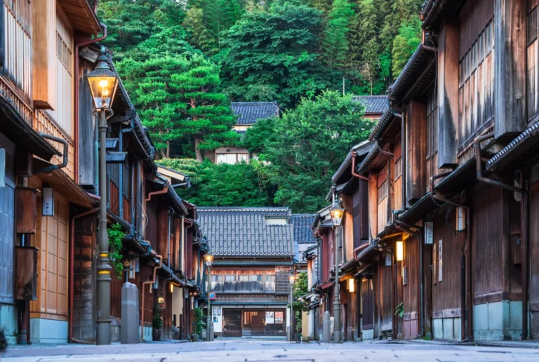 The Higashi Chaya teahouse district in Kanazawa with wooden lattice facades lining the stone-paved street