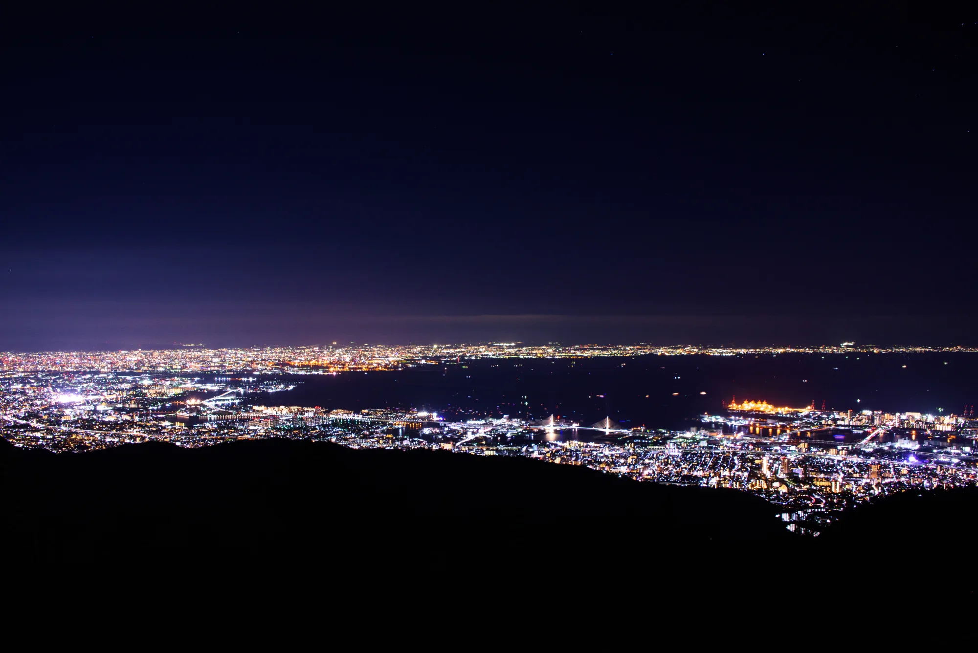 The night view of Kobe and Osaka Bay lights seen from the summit of Mt. Rokko, Hyogo