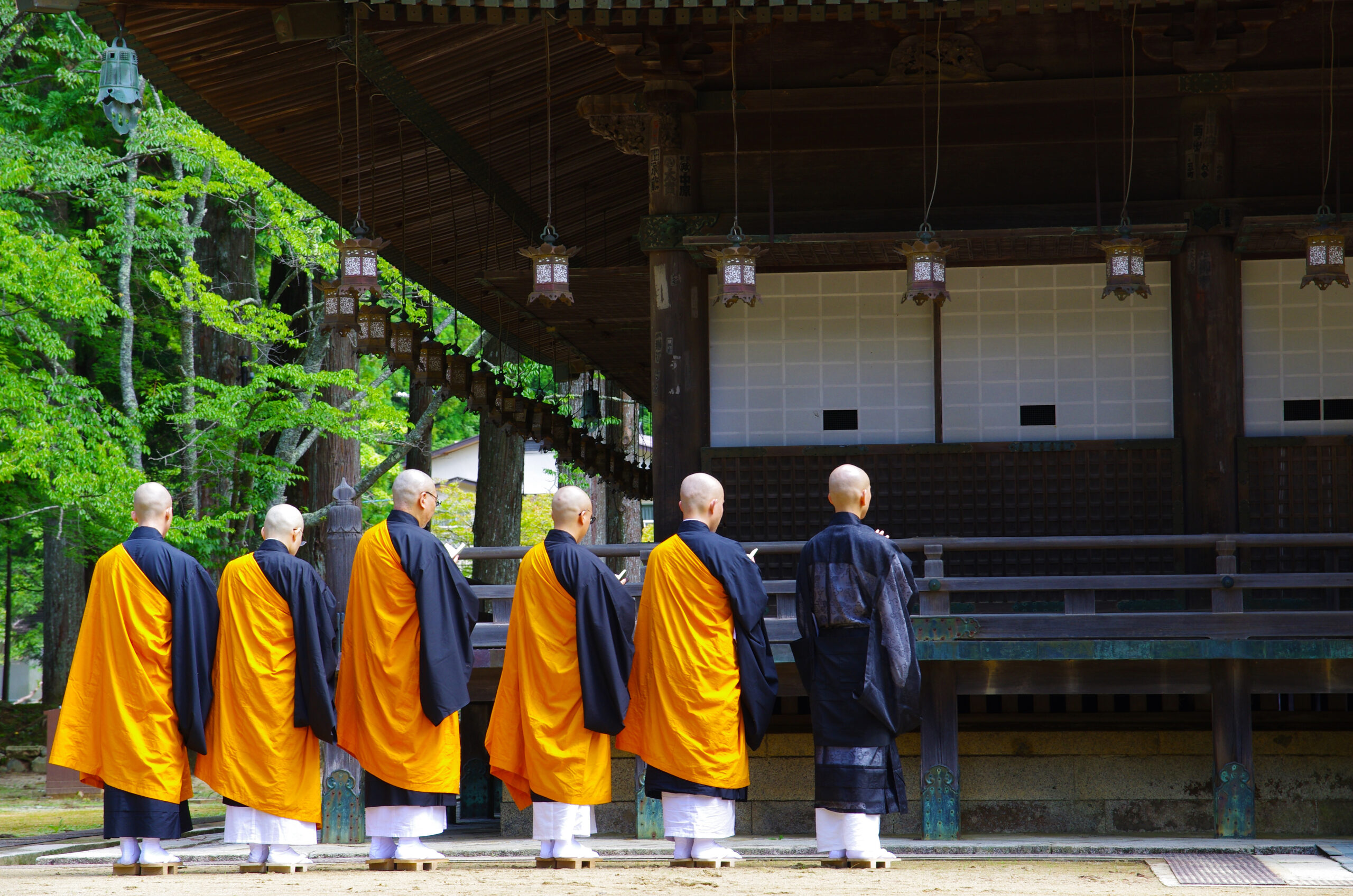 Buddhist monks in robes standing before a temple hall at Koyasan Mount Koya, Wakayama