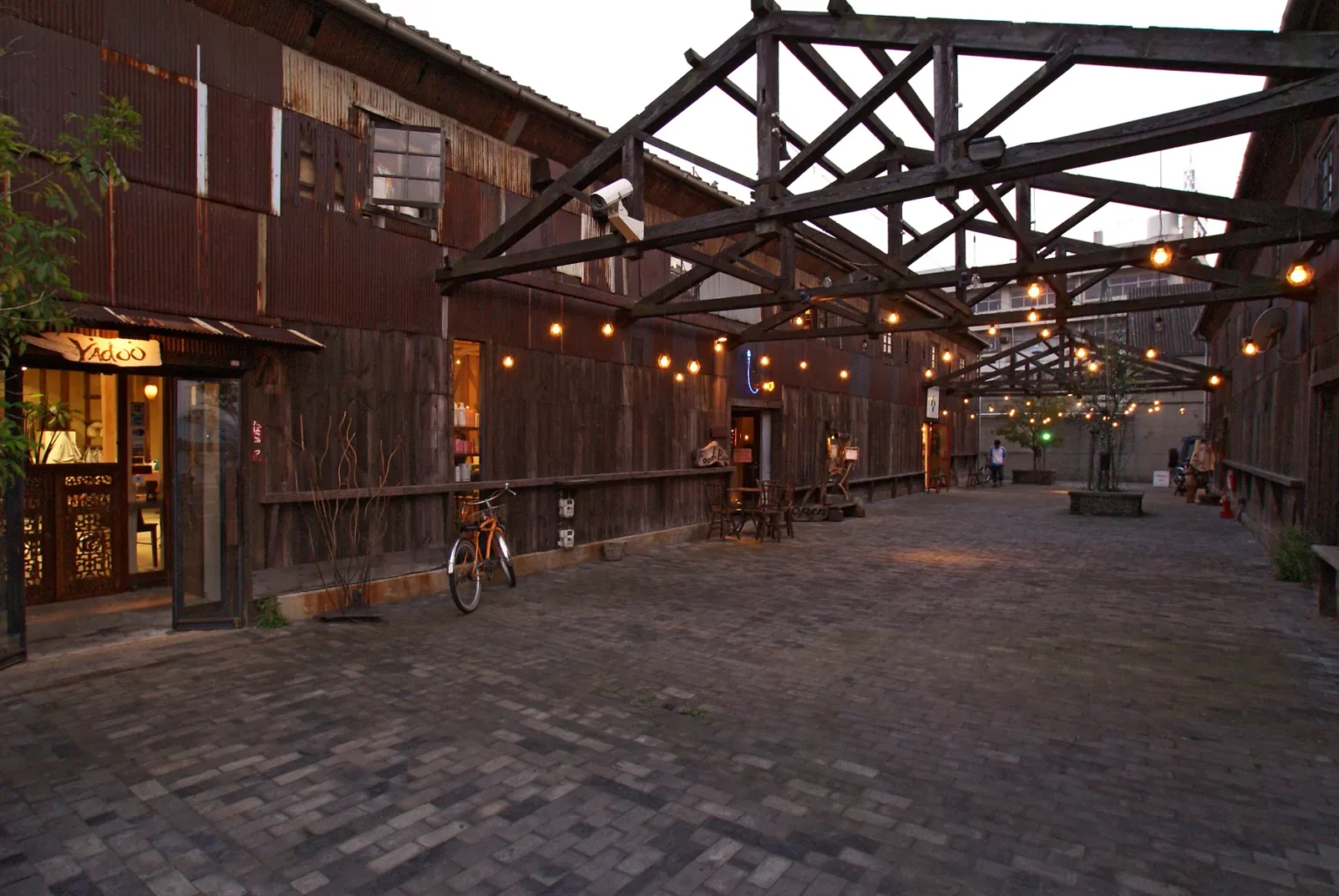 Old wooden warehouses turned into shops and cafes at Kitahama Alley in Takamatsu