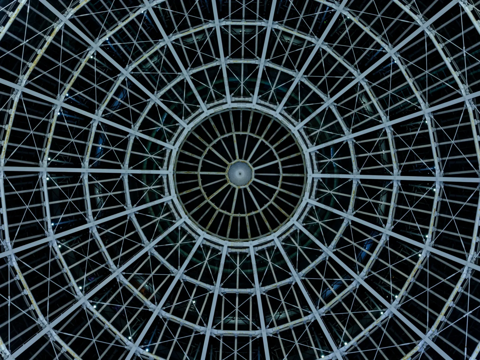 Looking up into the glass dome over the plaza at the north end of Marugamemachi arcade at night